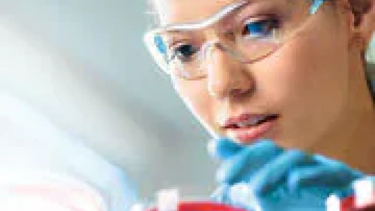 Scientist studying a sample