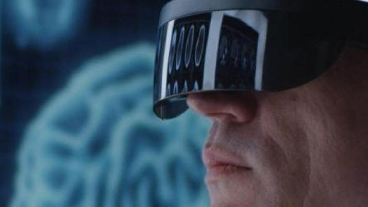 Doctor_examining_brain_scans_with_VR_glasses_2