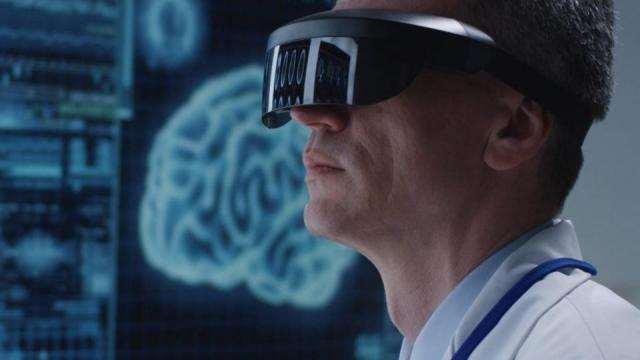 Doctor_examining_brain_scans_with_VR_glasses