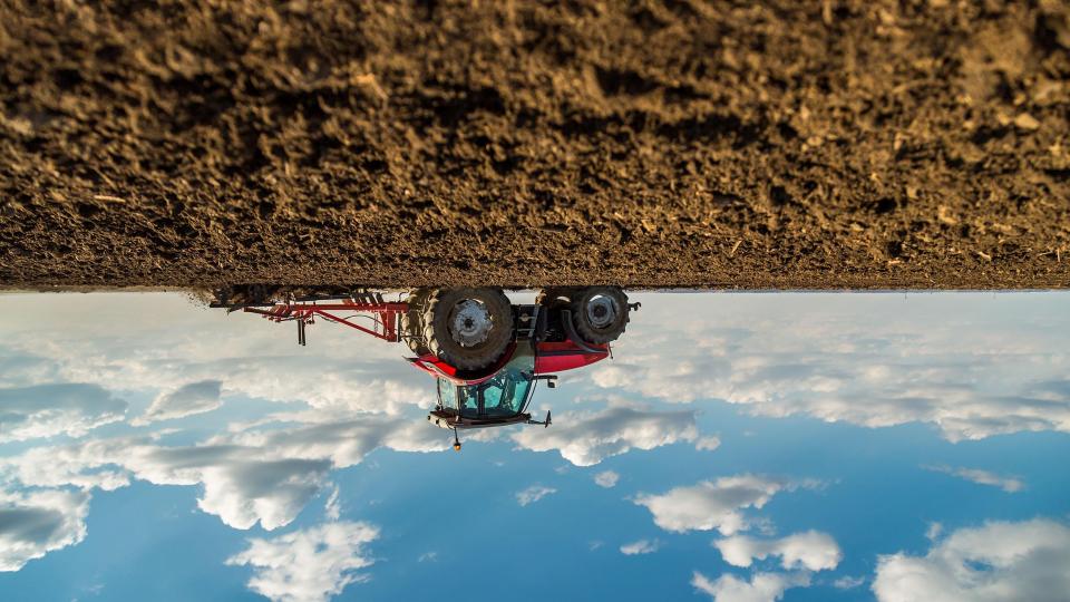 Upside down tractor and soil